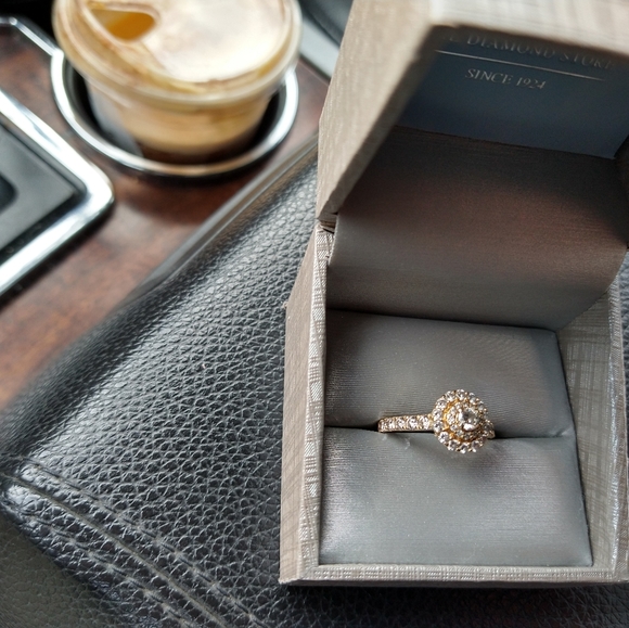 An engagement ring and man's wedding band . - Picture 10 of 10
